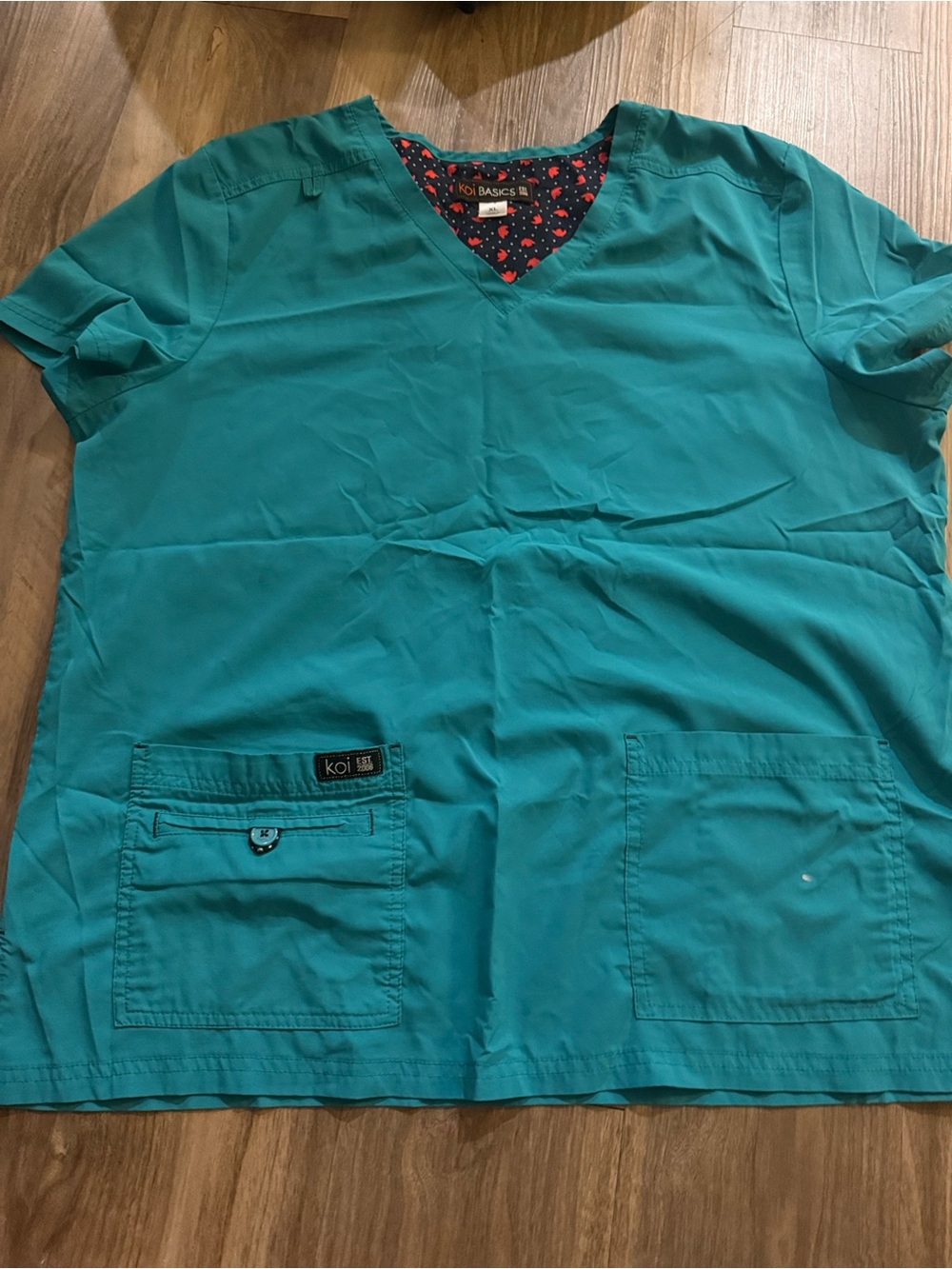 Women’s teal Scrub Top